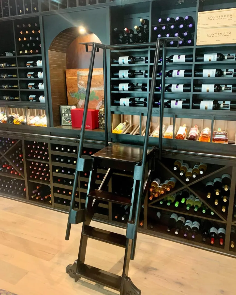 Wood racking and stone finishes in a Certified Wine Cellars project.